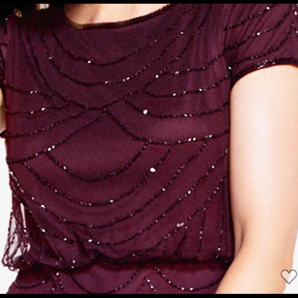 Adrianna Pappel long beaded gown, short sleeves.
